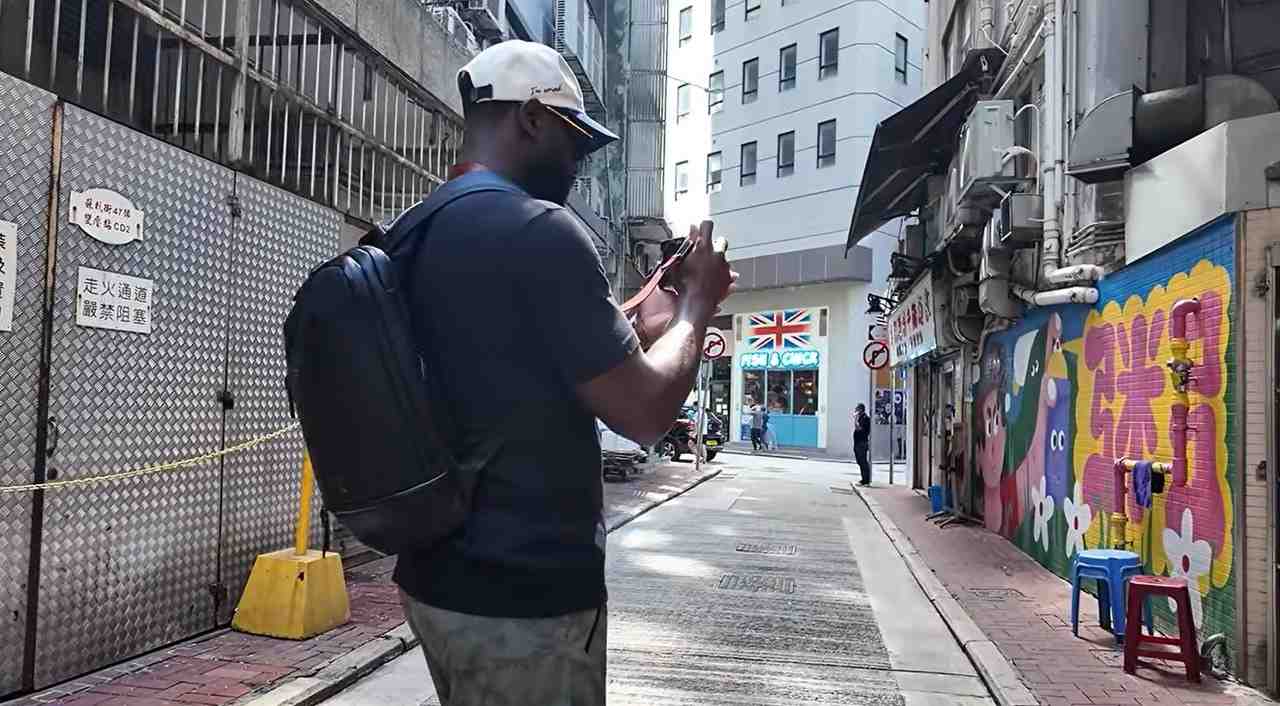 韦德谈喜欢摄影:大家总低头看手机 相机会让你重新抬头看世界